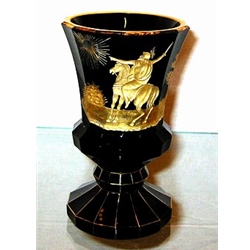 Cut and engraved goblet. Dark coloured glass